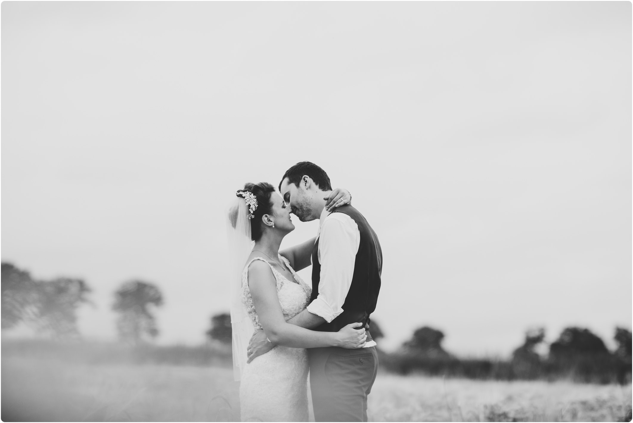 Swallows Nest Barn couple shoot in fields