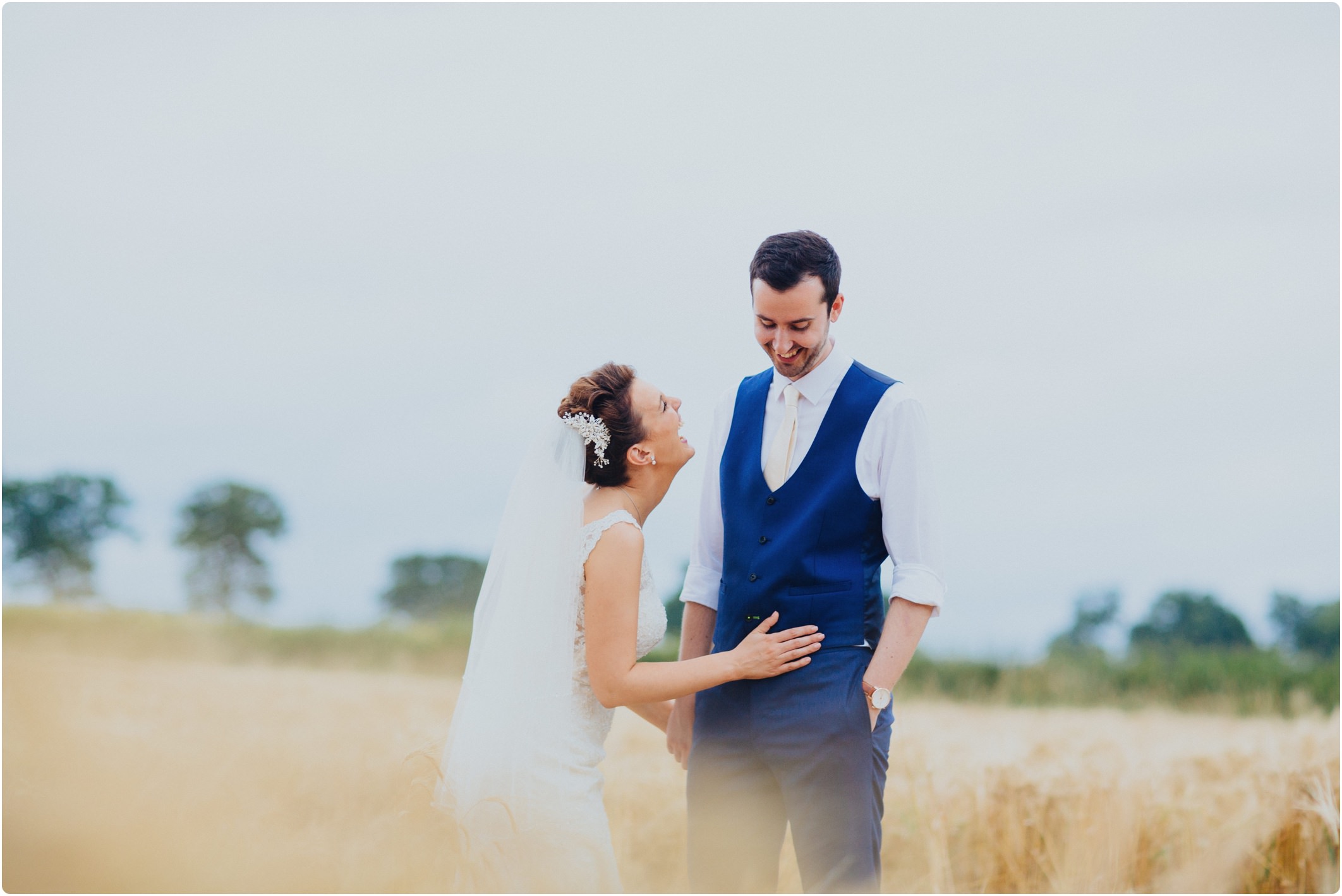 Swallows Nest Barn wedding couple shoot in field