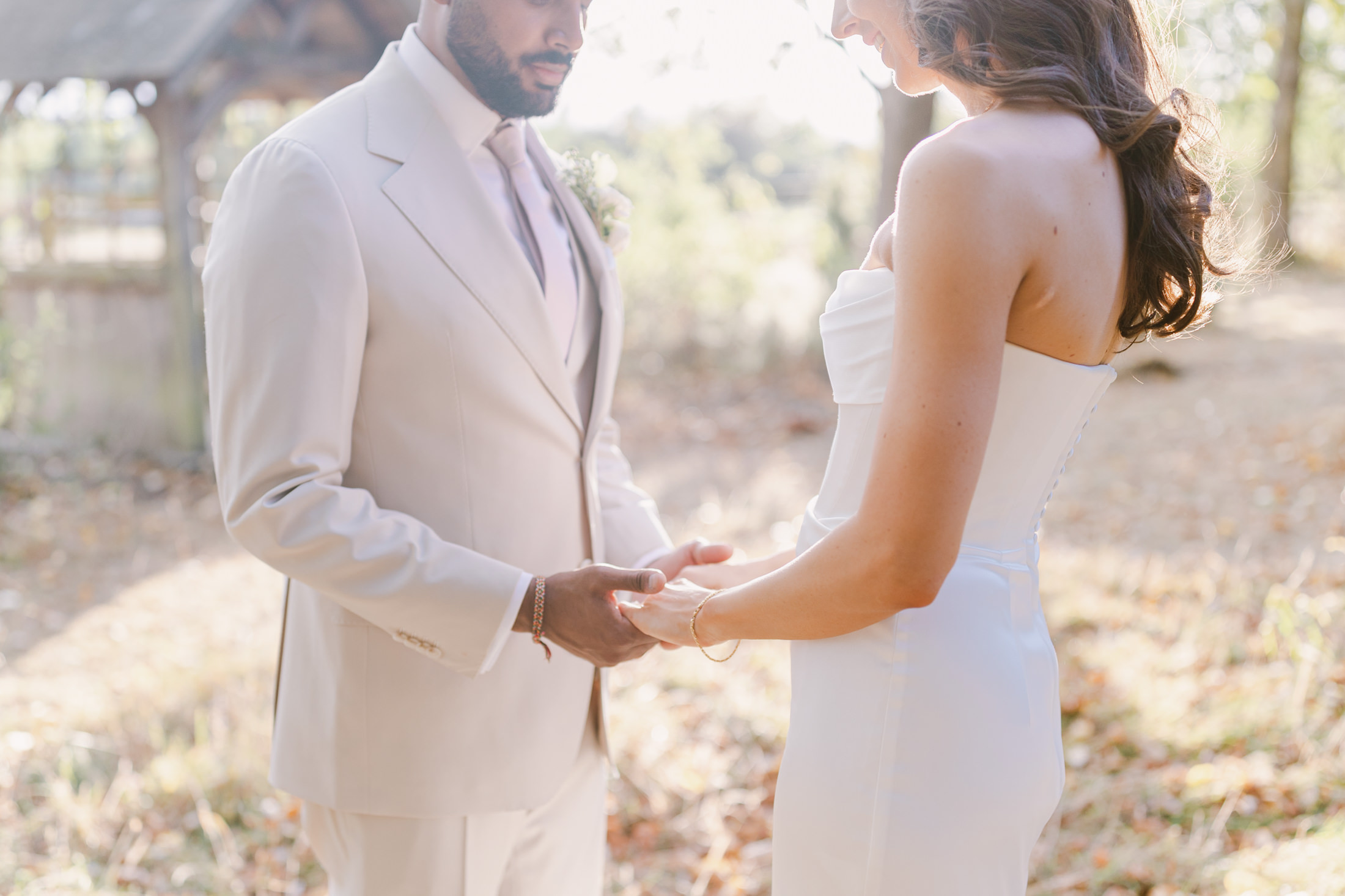 soft gentle hand hold between bride and groom at launton Oxford barn